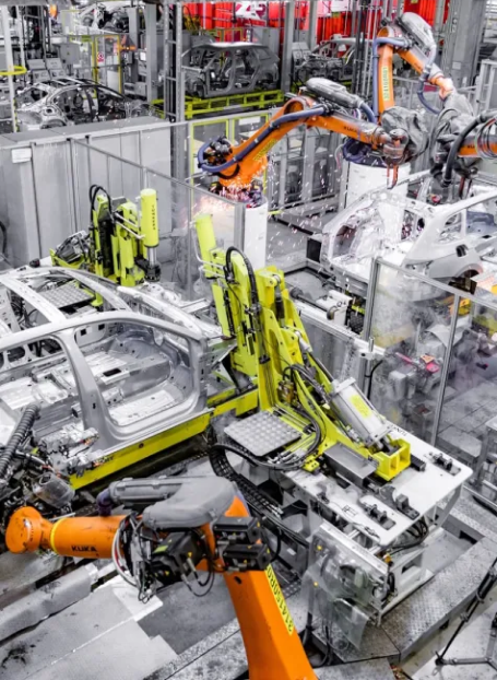 Metal components manufacturer worker operating machinery